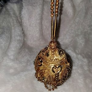 Royal shiny ethnic gold beaded iron clutch bag